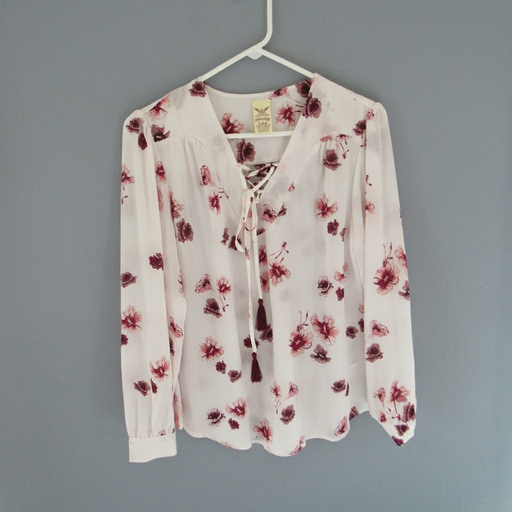 White blouse with maroon and pink glitter flowers